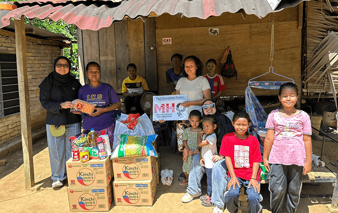 Volunteers delivering essential supplies to a rural family
