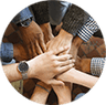 A group stacking their hands together