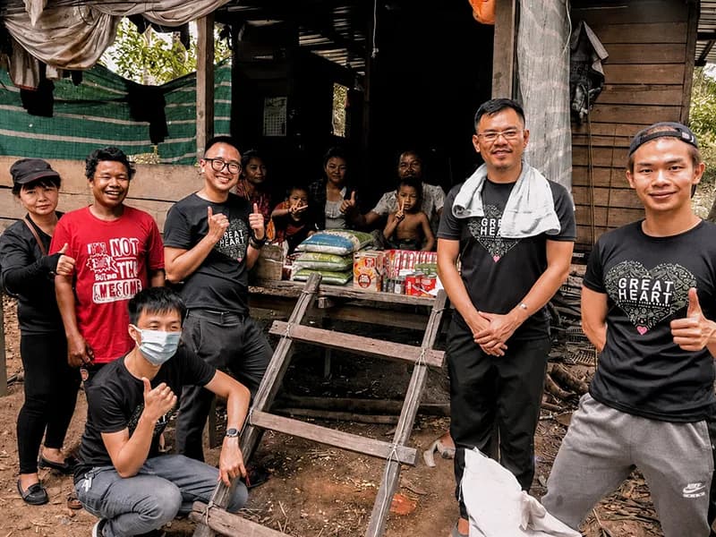 Great Heart volunteers with an Orang Asli community