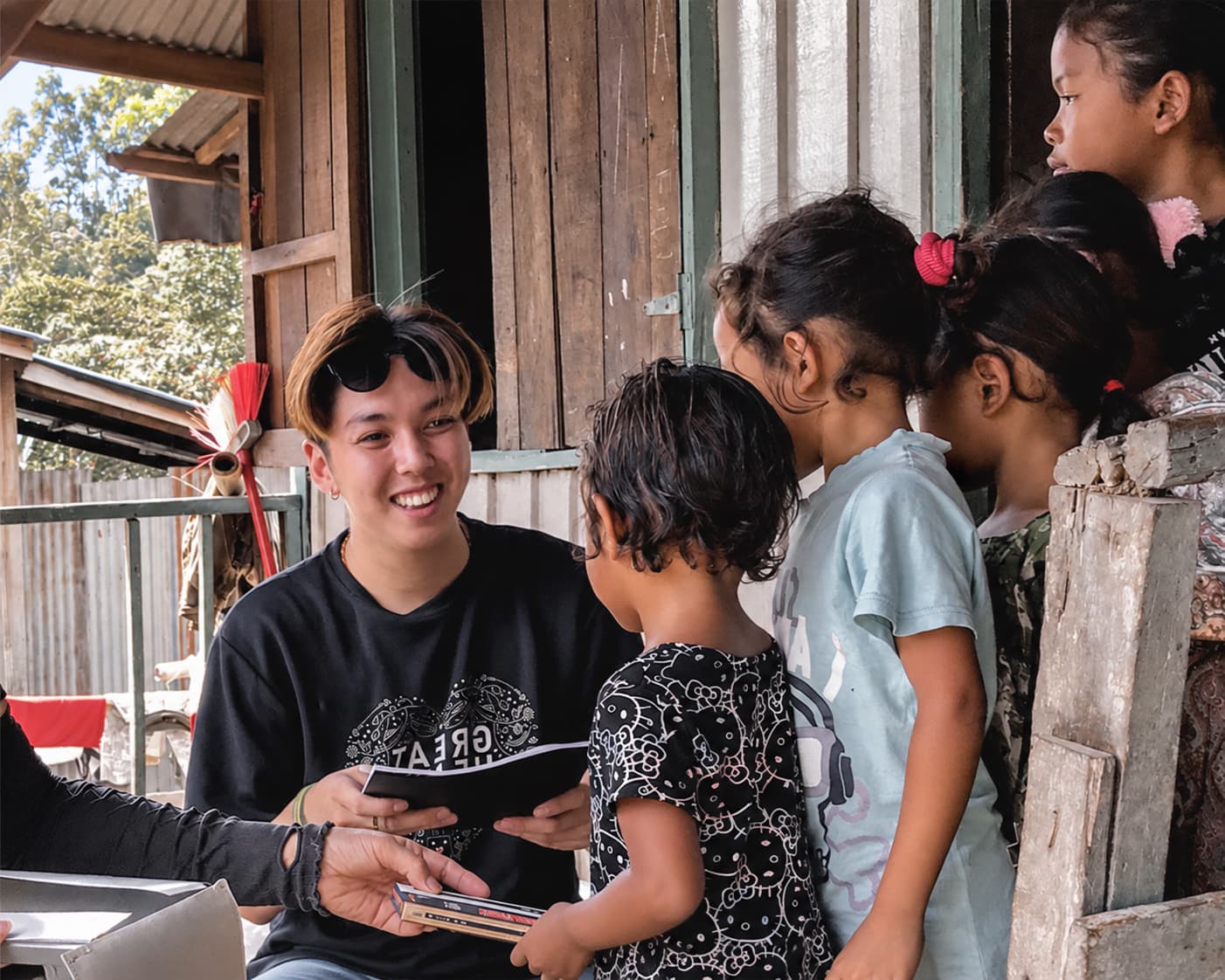 Andrew Lim engaging with children during a Great Heart activity