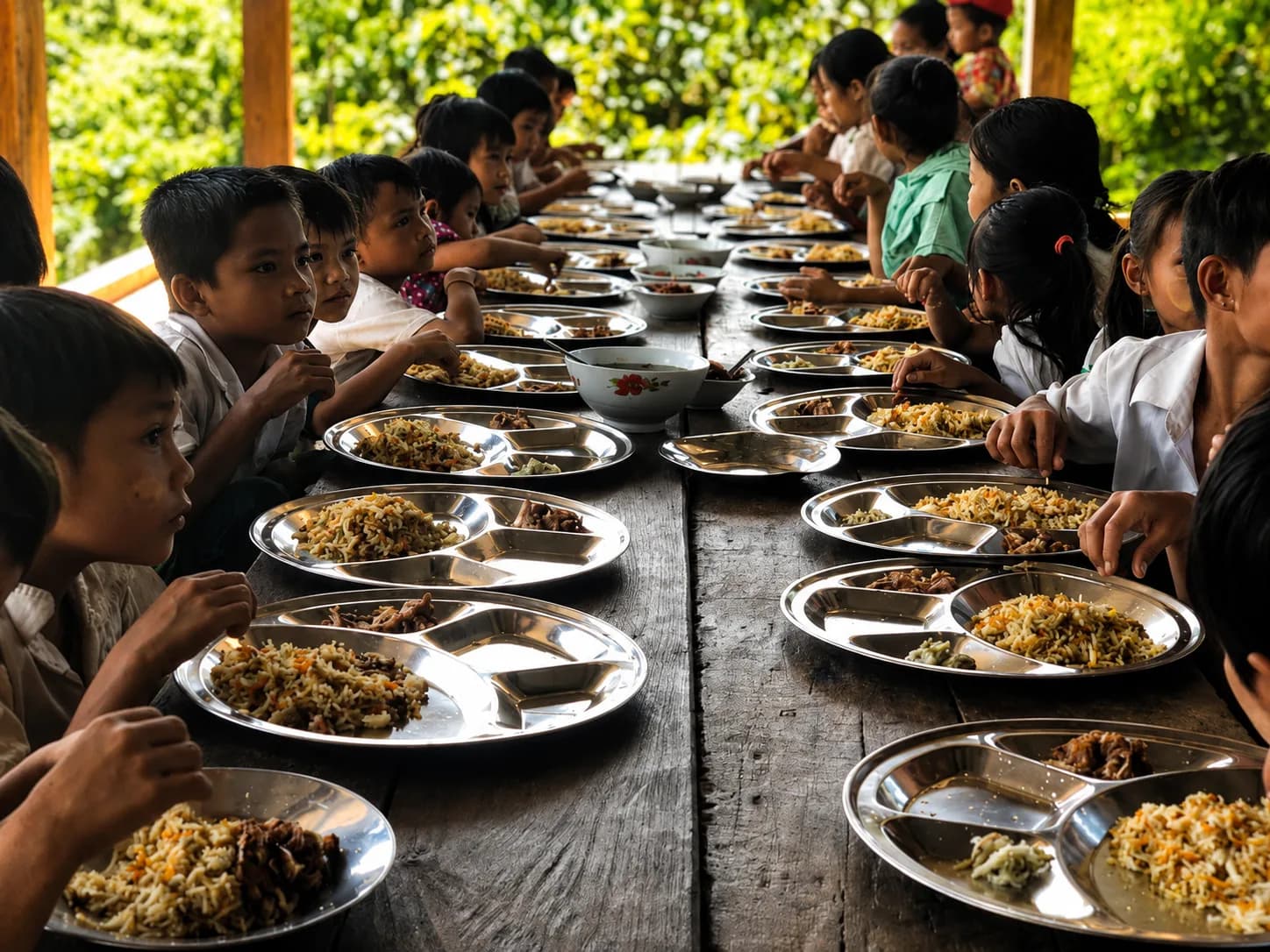 Children sharing a nutritious meal during an overseas community programme