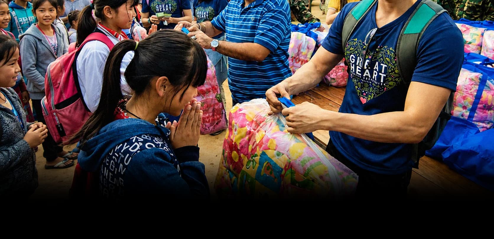 Great Heart volunteers distributing aid during an overseas programme