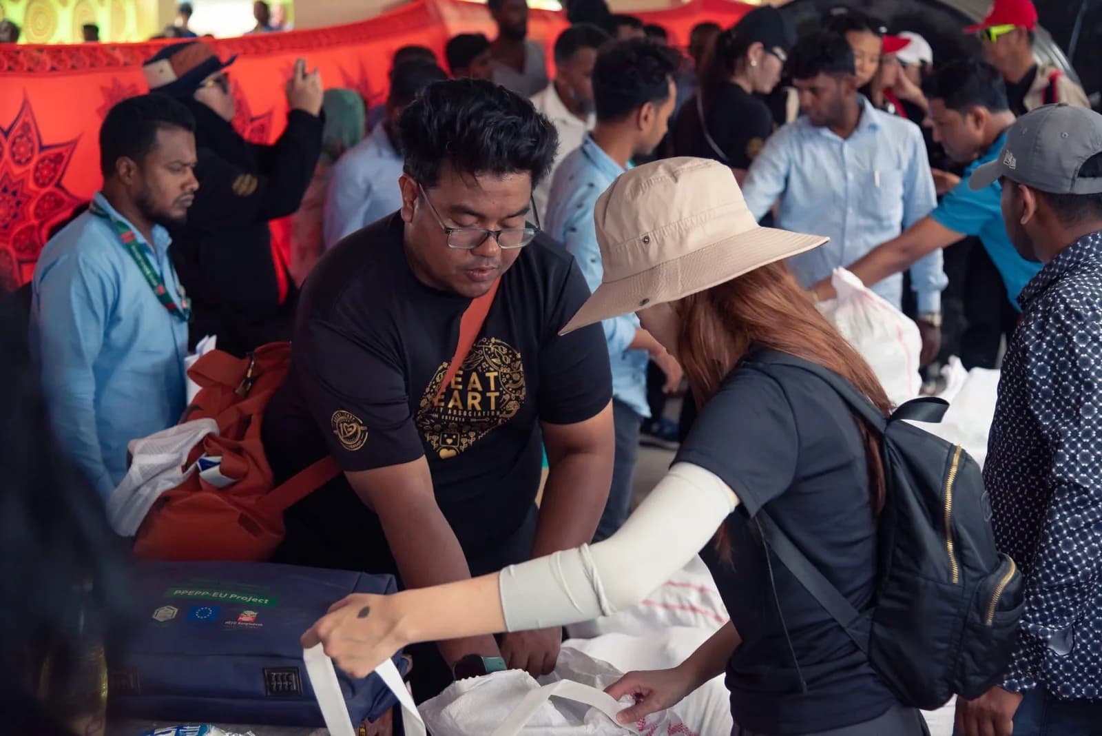 Volunteers organising supplies during an outreach programme