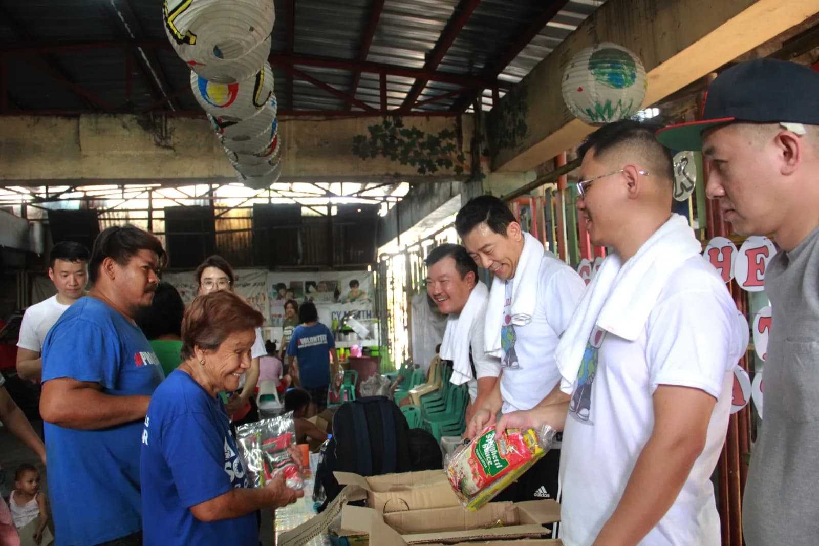 Volunteers delivering food supplies to a community
