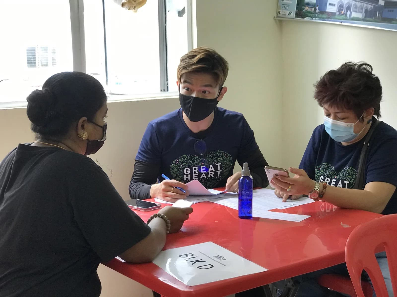 Great Heart volunteers assisting at a registration table