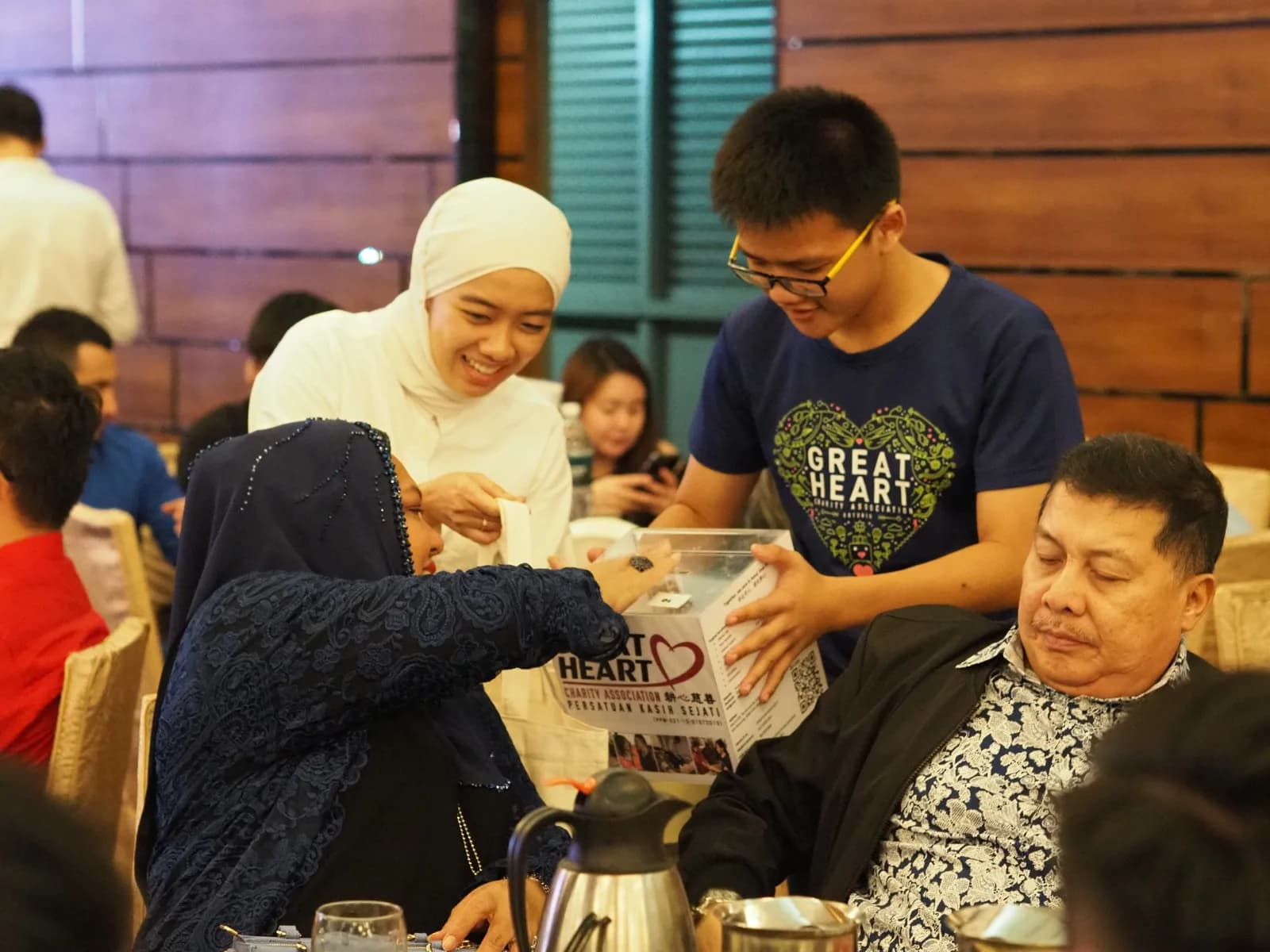 Young Great Heart volunteers supporting a fundraising dinner