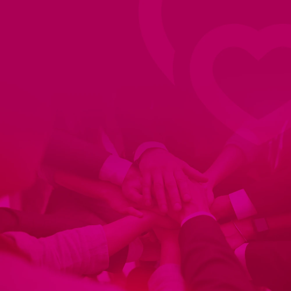 Hands holding a heart together